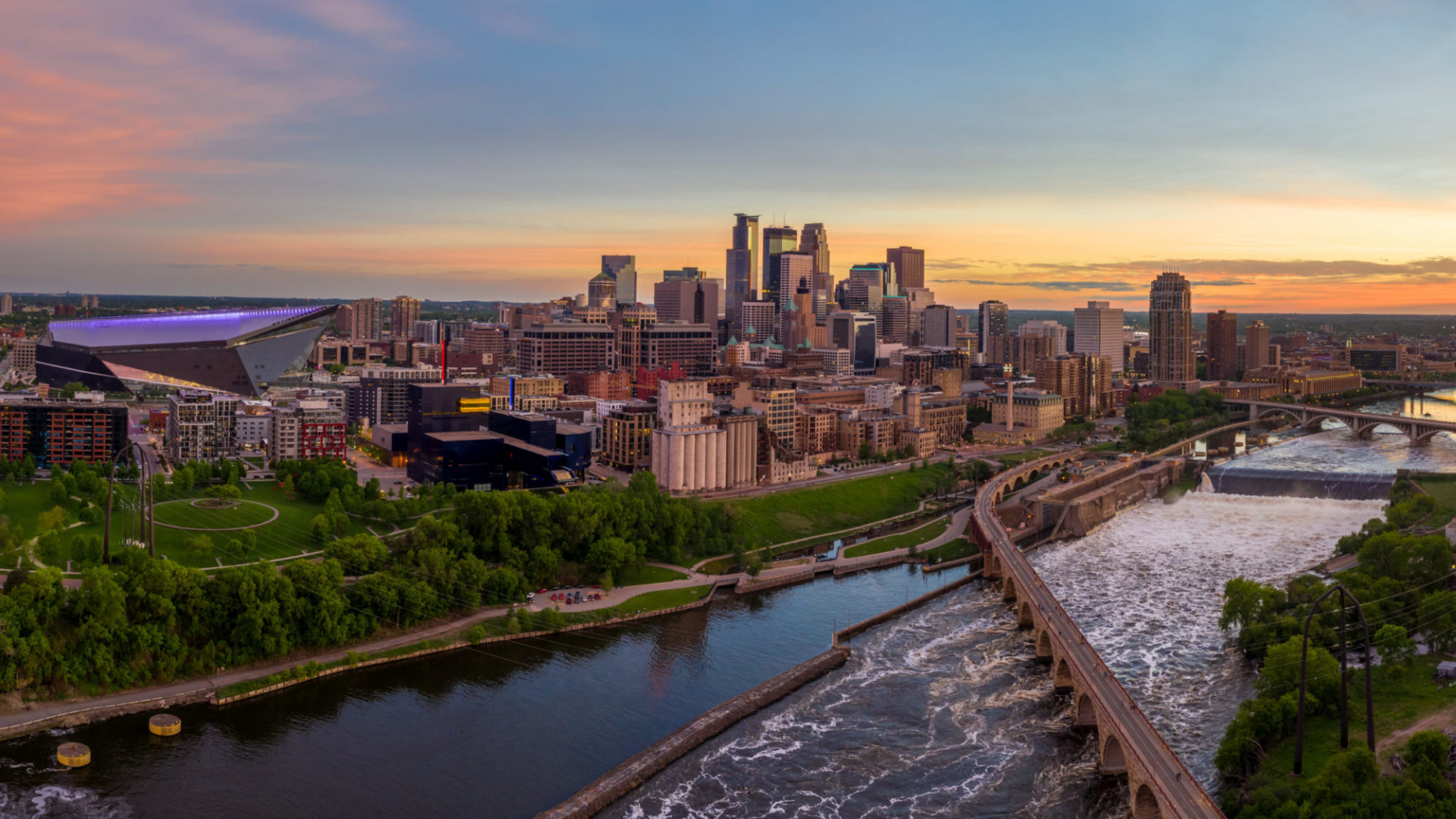 Minneapolis skyline at sunset over the Mississippi River